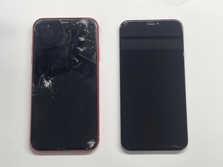 Cracked iPhone XR screen on the left, replacement display on the right at Romans Repairs Wokingham